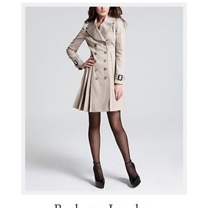 Burberry Trench coat/rain coat, barely worn, excellent condition. Pleated back.